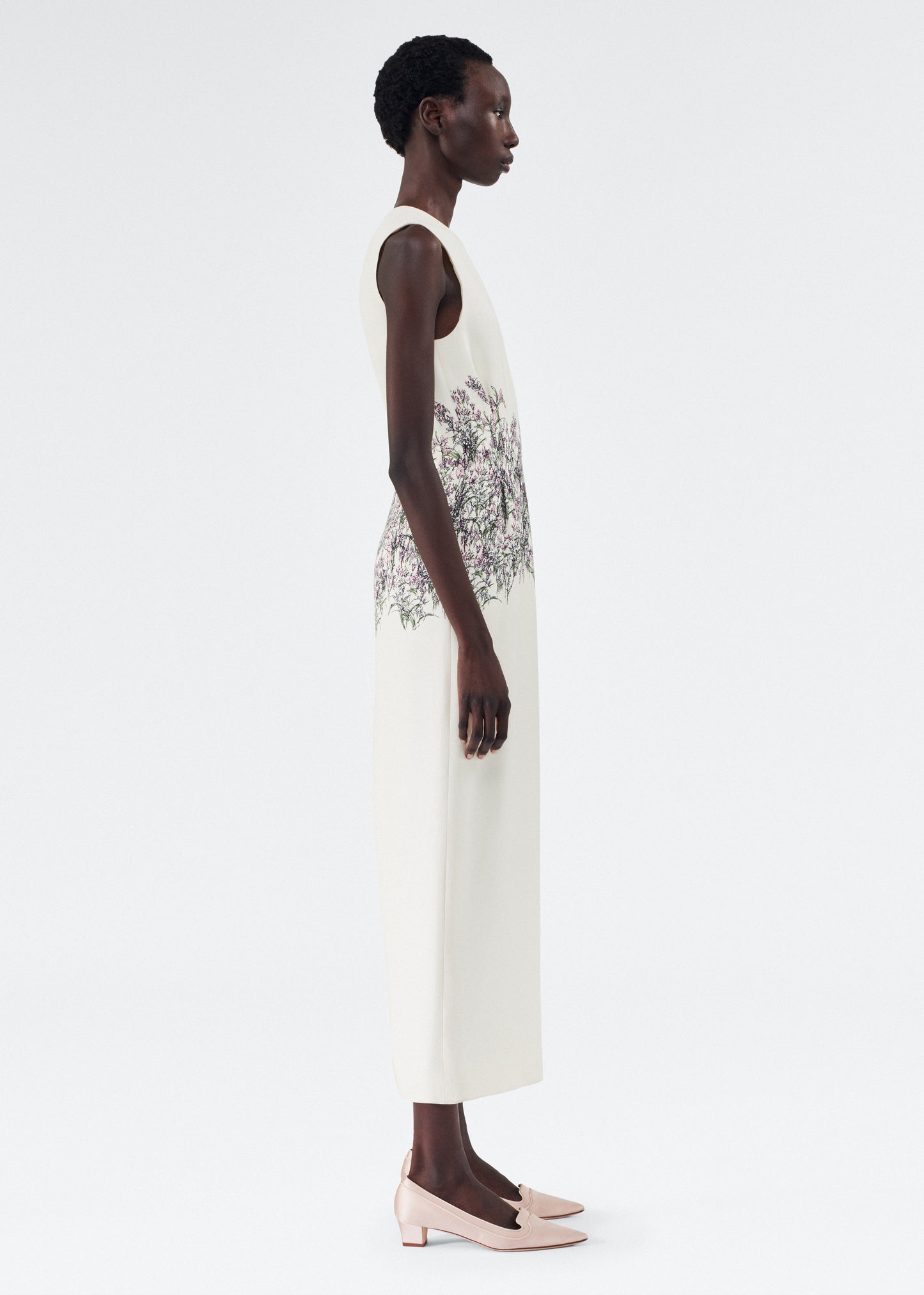 Side of model wearing the Ophelia Dress in Printed Silk Wool in Rose/Ivory