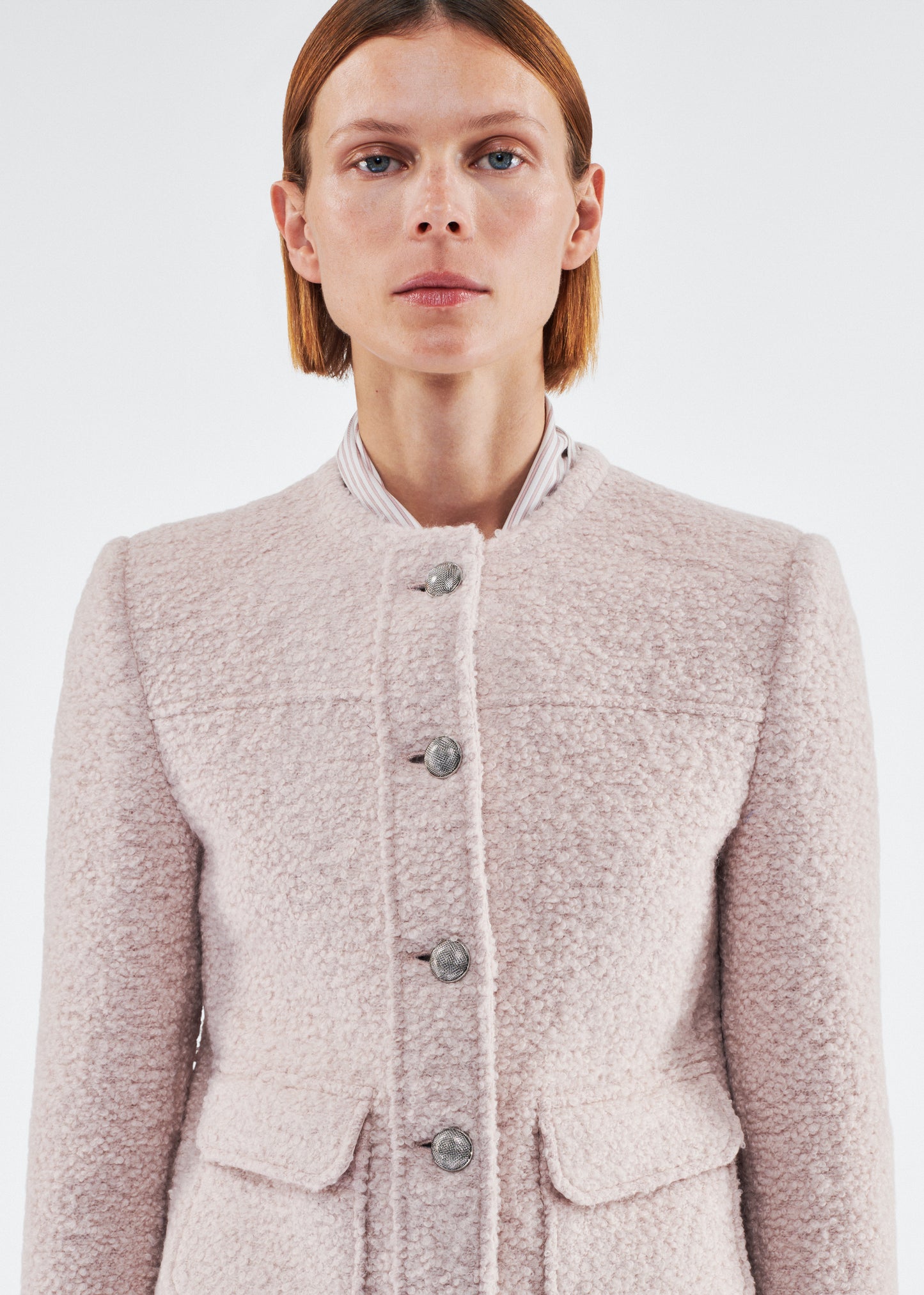 Close up of model wearing the Lana Jacket in Brushed Boucle in Blush