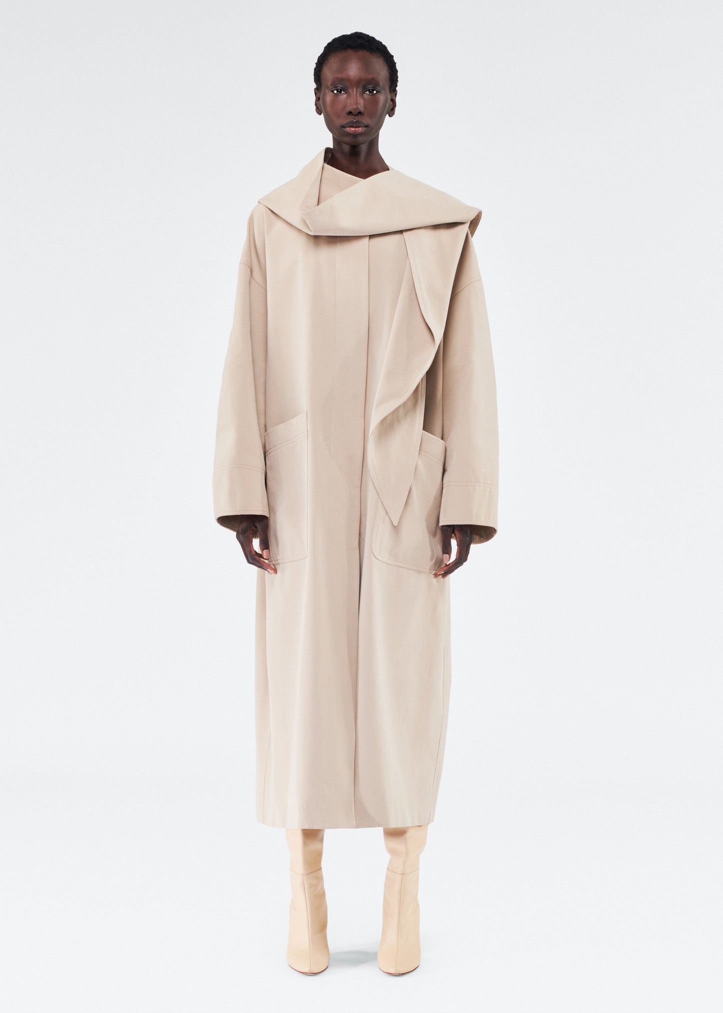 model wearing gesse coat by adam lippes in cotton twill in khaki
