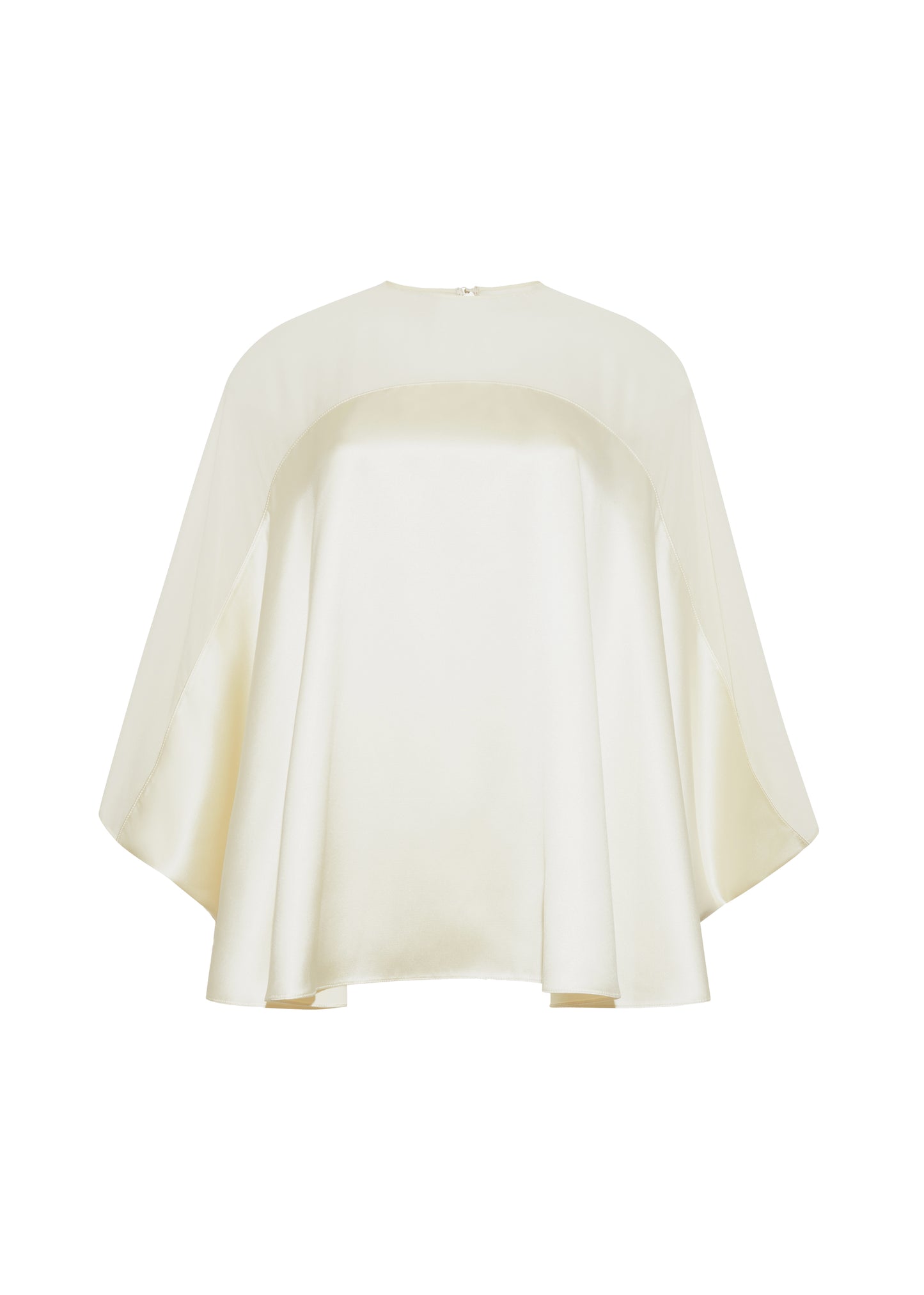 Ghost image front– apollo top, P25127DC, cream – Adam Lippes, P25 collection: A new shape from the atelier, the Apollo Top is crafted from luxurious 100% silk in a soft cream hue. The flowing, draped design features a high-neck collar and a cascading silhouette, exuding modern elegance.