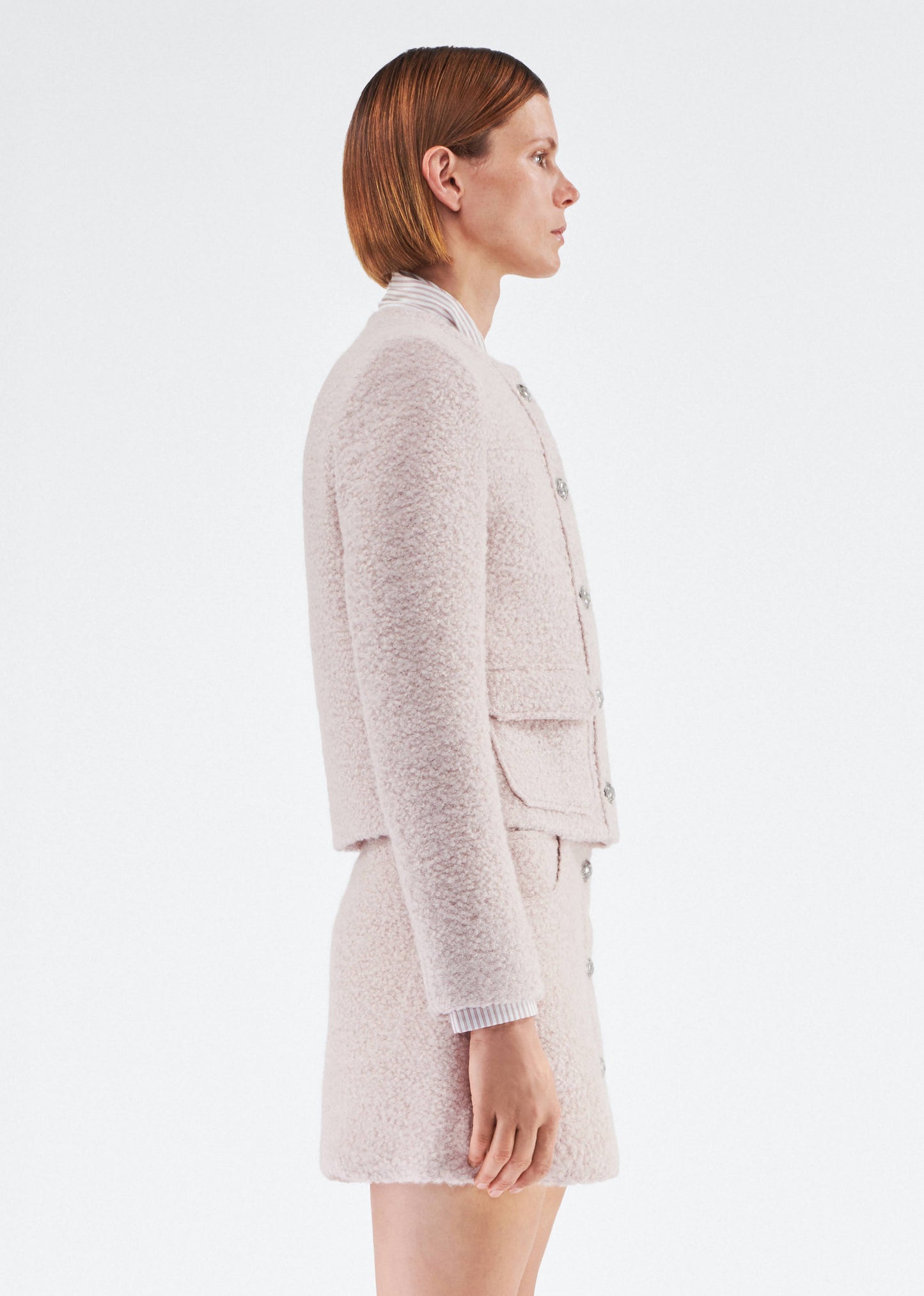 Side View of model wearing the Lana Jacket in Brushed Boucle in Blush