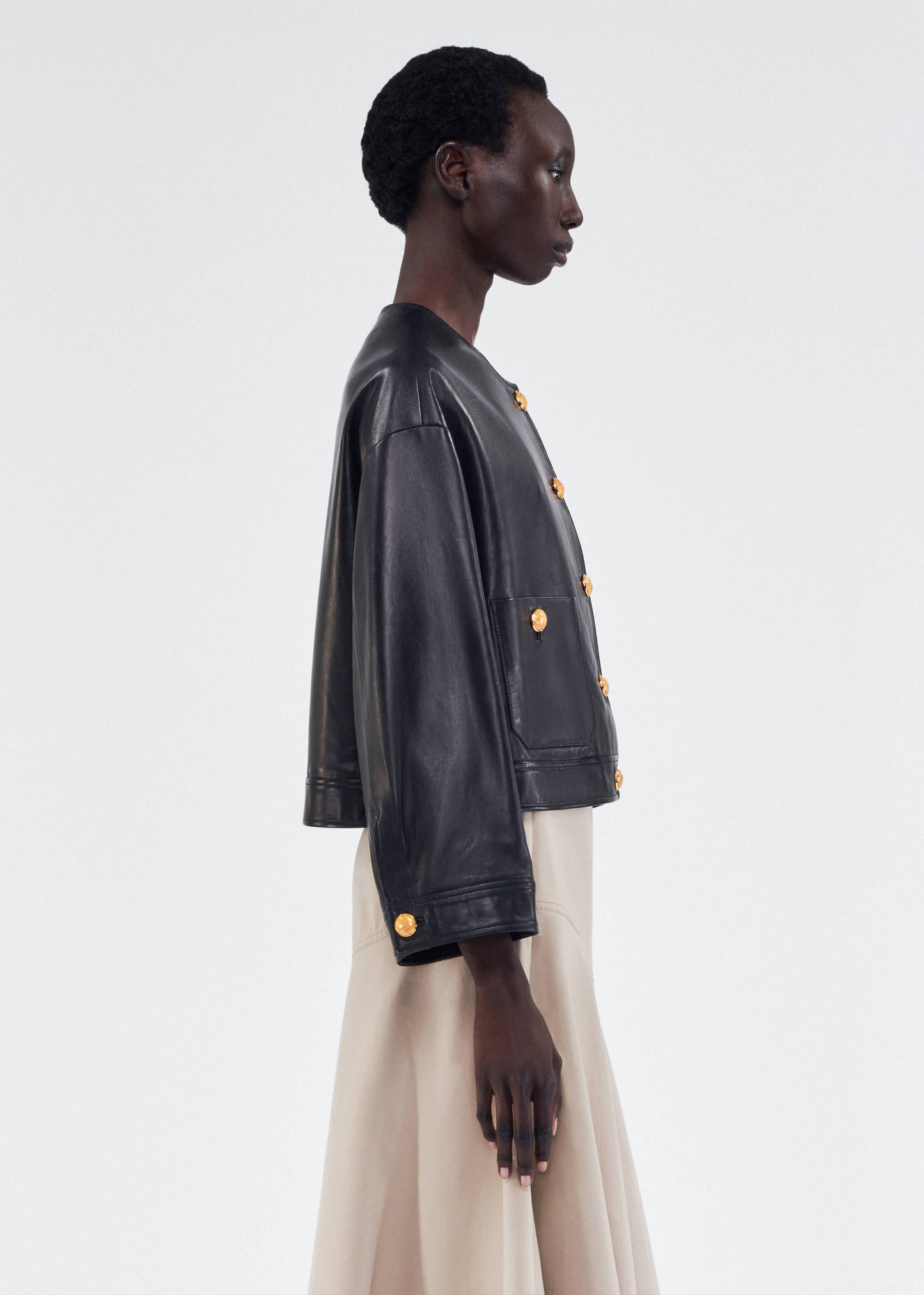 on figure side image of the Adam Lippes Nessy Jacket in Leather Black