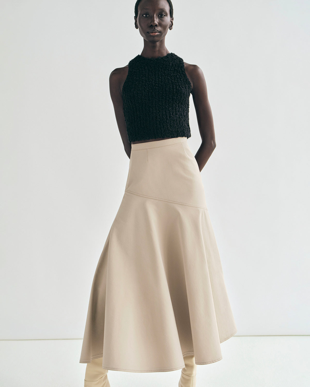 lookbook image of model wearing the skirt and mulberry knit 