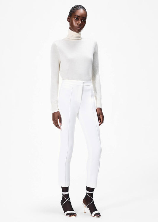 model wearing the cigarette pant in stretch cady in ivory by Adam Lippes