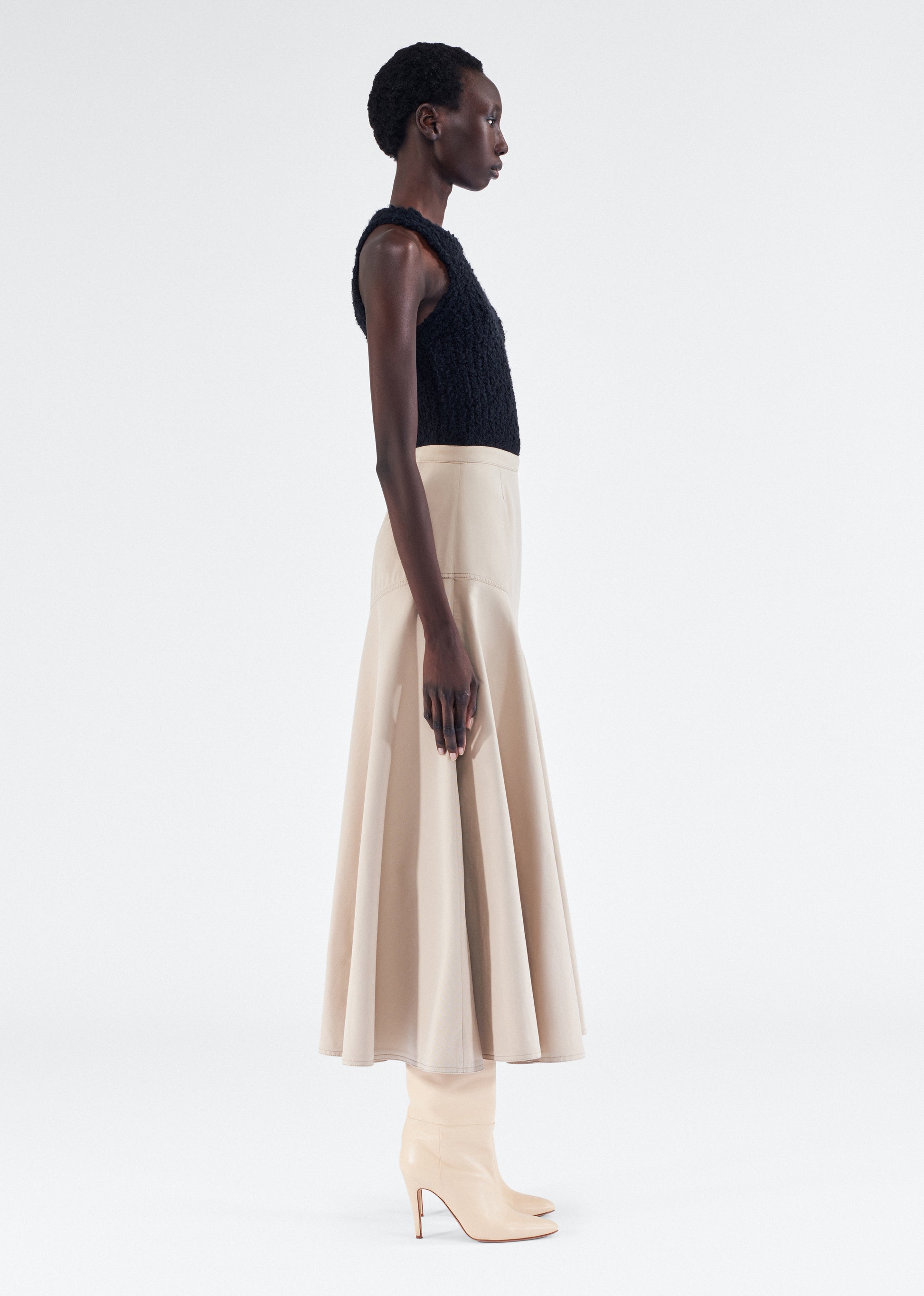 Model wearing the Tess Skirt in Cotton Twill, in Khaki 