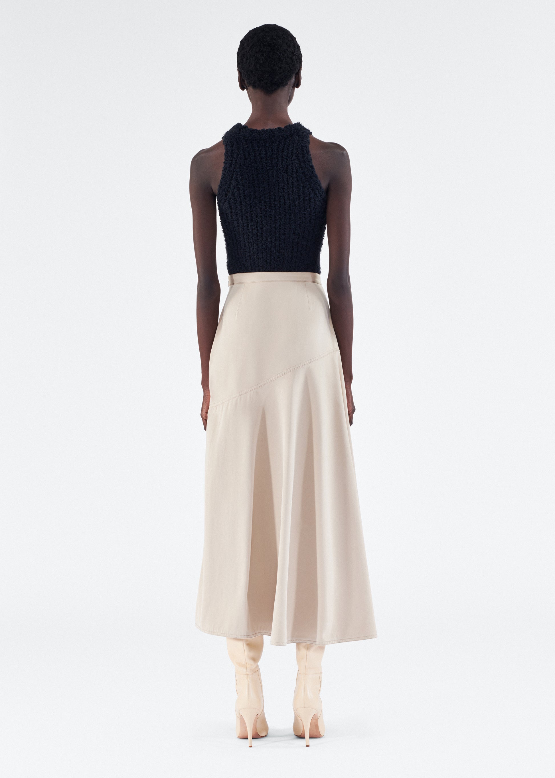 Model wearing the Tess Skirt in Cotton Twill, in Khaki 