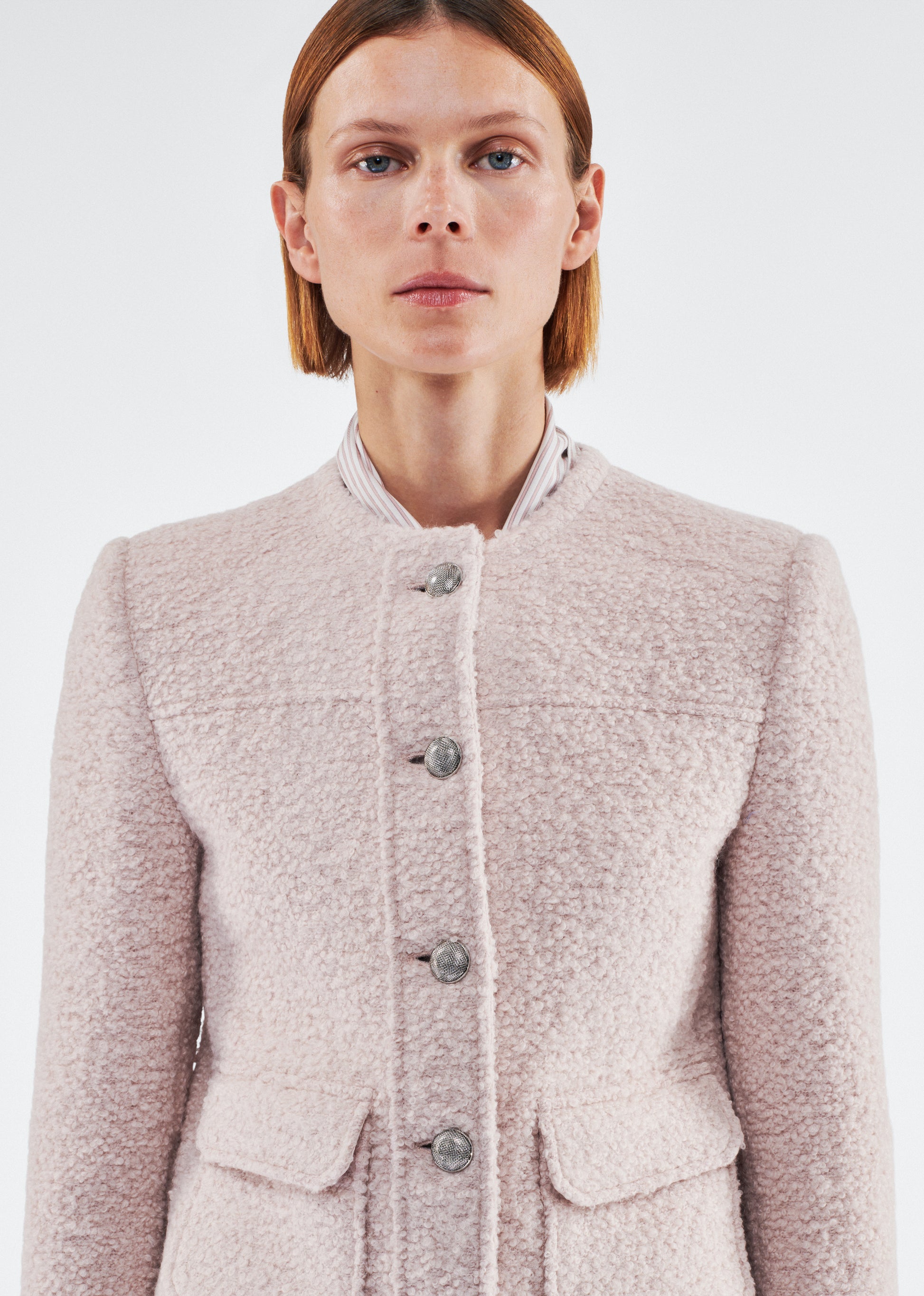 Close up of model wearing the Lana Jacket in Brushed Boucle in Blush