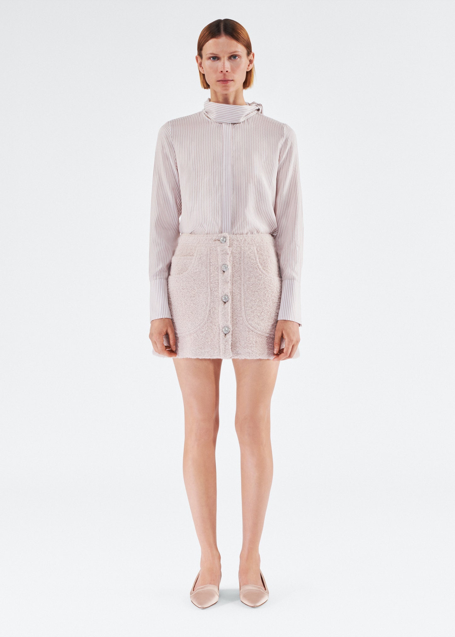Front of model wearing the Maisey Skirt in Brushed Boucle in Blush