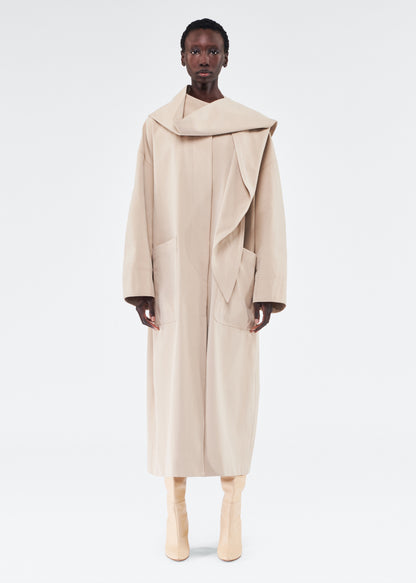 model wearing gesse coat by adam lippes in cotton twill in khaki
