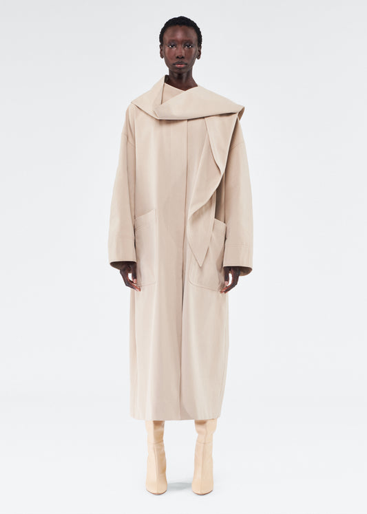 model wearing gesse coat by adam lippes in cotton twill in khaki