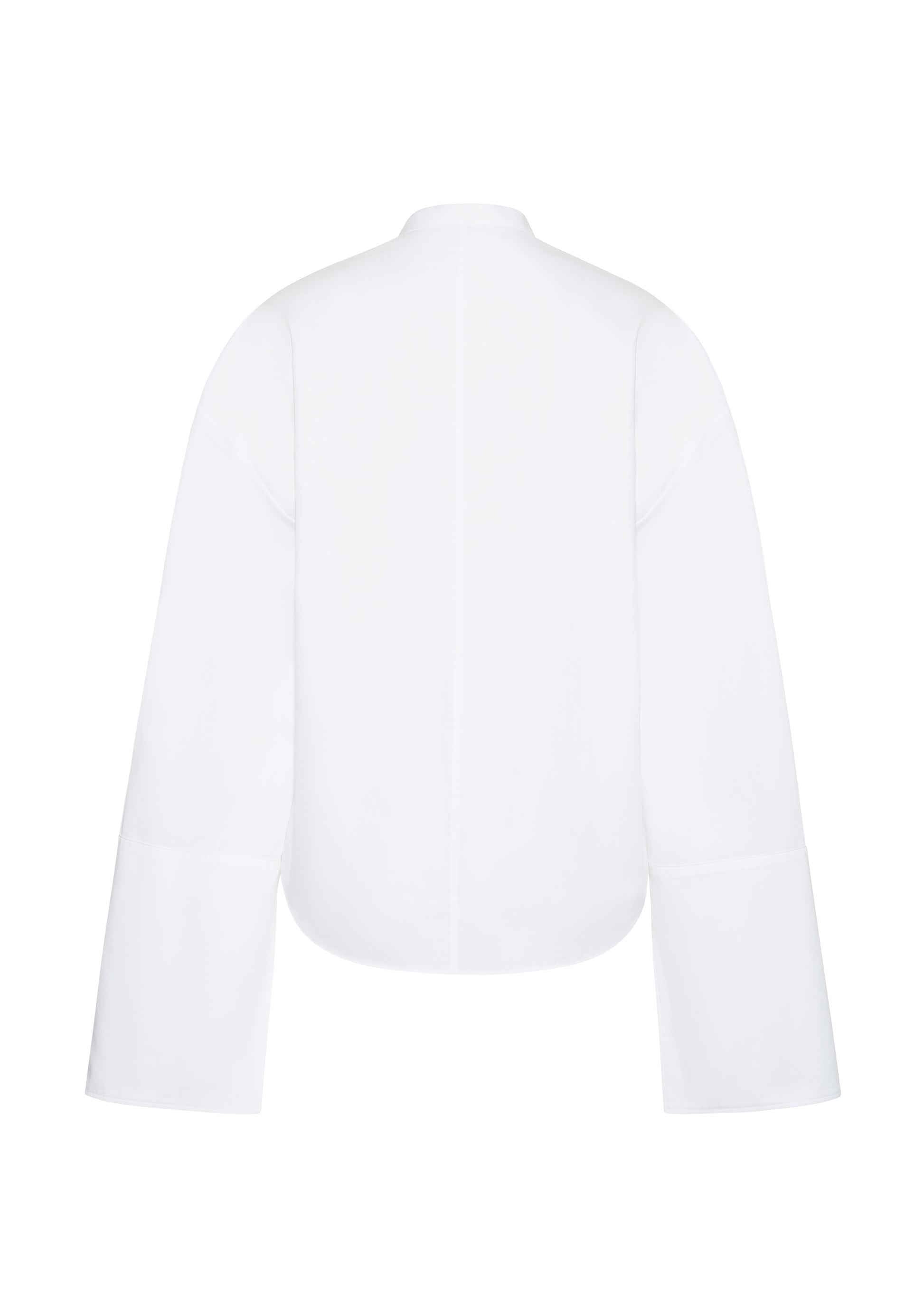 ghost image back – mick top, P25145CS, white – Adam Lippes, P25 collection: A new shape for the season, the Mick Top is crafted from crisp organic cotton poplin in classic white. The top features a tie closure at the center front, adding a subtle touch of modern sophistication. Billowy sleeves with split cuffs create an airy and elegant silhouette. Includes a silk cami for added comfort and versatility.