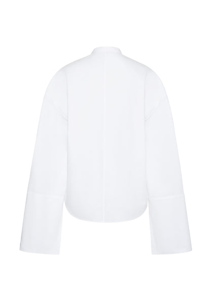 ghost image back – mick top, P25145CS, white – Adam Lippes, P25 collection: A new shape for the season, the Mick Top is crafted from crisp organic cotton poplin in classic white. The top features a tie closure at the center front, adding a subtle touch of modern sophistication. Billowy sleeves with split cuffs create an airy and elegant silhouette. Includes a silk cami for added comfort and versatility.