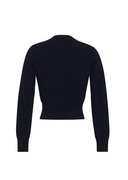 Ghost image back, P25625UB, Faye Cardigan in black, Adam Lippes P25 collection: A classic pointelle stitch cardigan, crafted in our signature compact jacquard. Designed with a fitted bodice and delicat stitching, the piece is finished with covered buttons along the front placket for a refined look.
