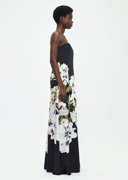 Model facing side, P25761PD, the Marais Dress in Black/white, Adam Lippes P25 Collection, The strapless silhouette of the Marais Dress offers an elegant, flowing shape for formal occasions. Luminous silk is beautifully adorned with this season’s Sicily-inspired floral motif.