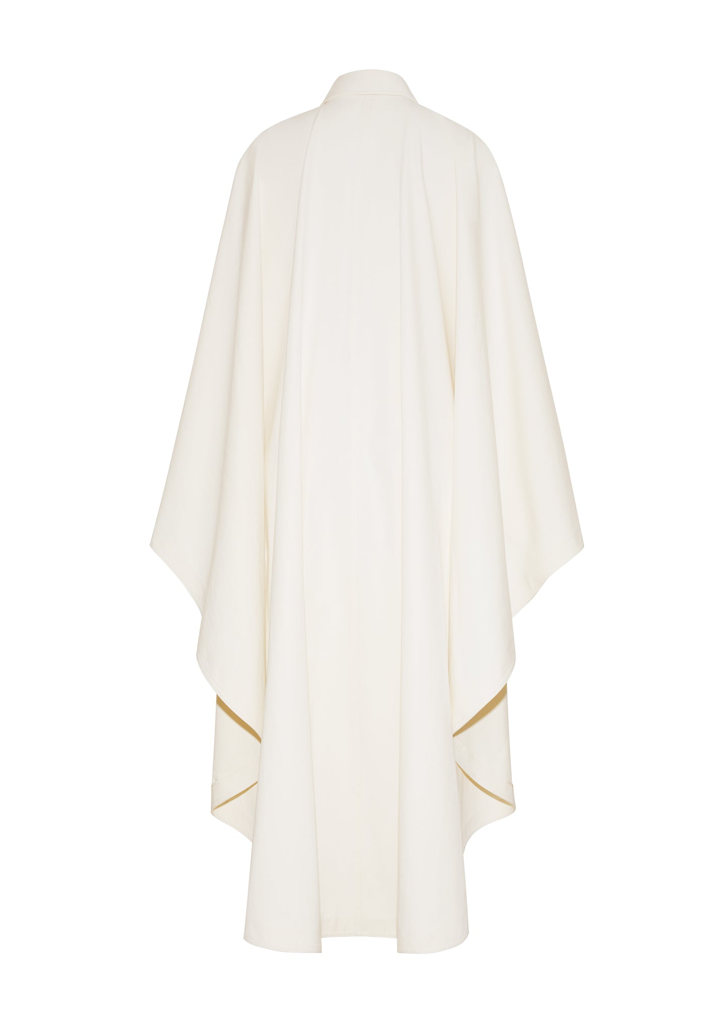 Ghost image back, The Langston Poncho, P25914CT, in color ivory, Adam Lippes P25 collection; The Langston Poncho in ivory cotton twill offers an elegant take on the classic poncho. With its modern, relaxed shape, sharp tailoring, and hidden corozo button closure down the center front, it effortlessly elevates any ensemble. The ivory hue and clean lines are complemented by thoughtful details.