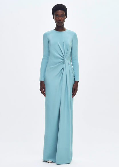 front profile of model wearing the long draped dress in silk crepe in mist