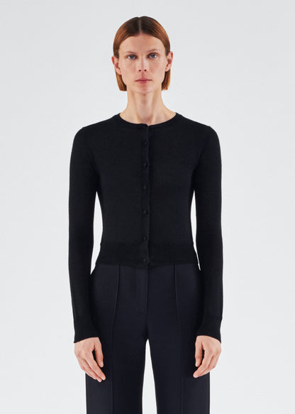 model wearing the adam lippes cardigan in cashmere silk in black