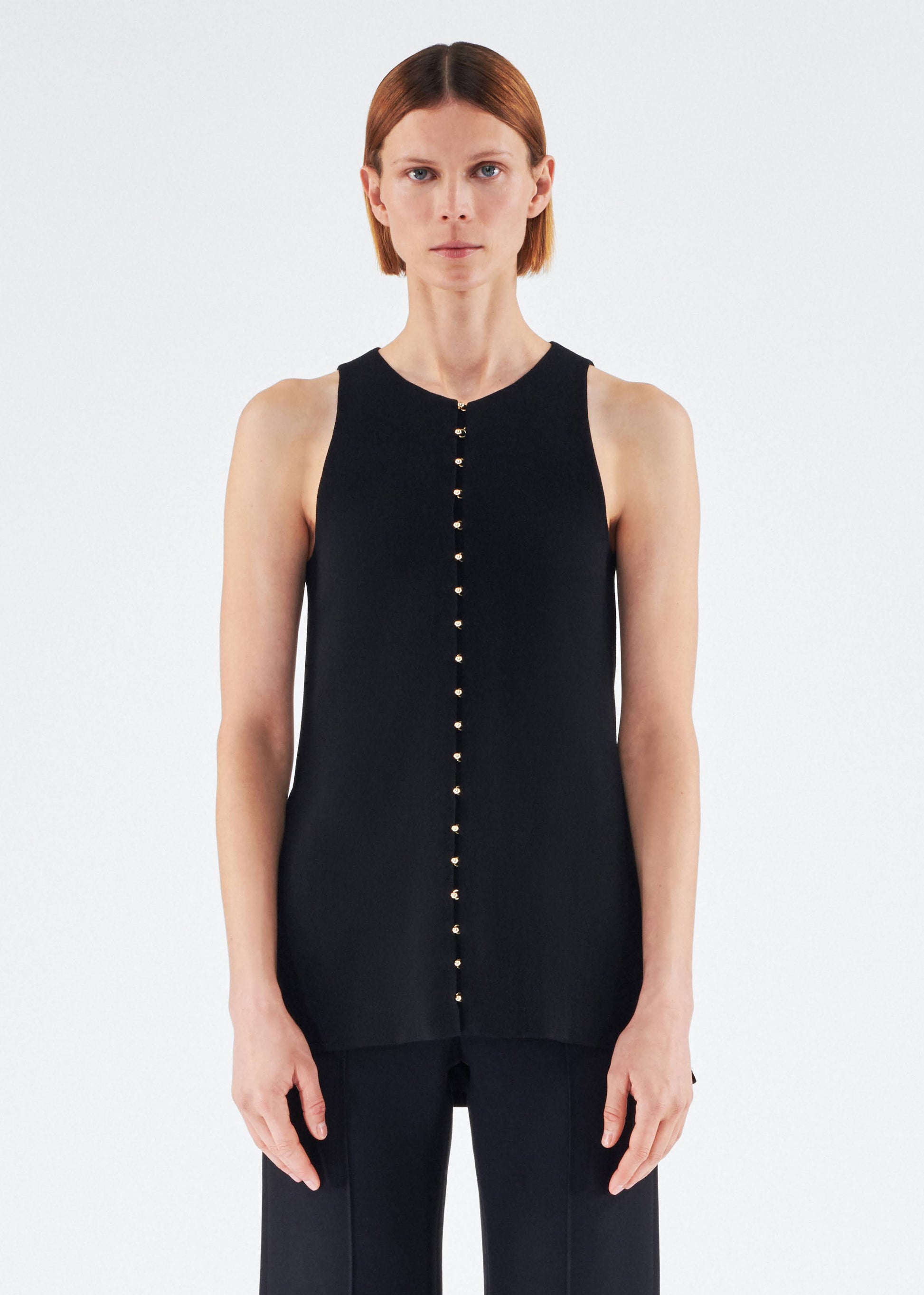 Front of model wearing the Nazra Tunic in Light Wool Crepe Black
