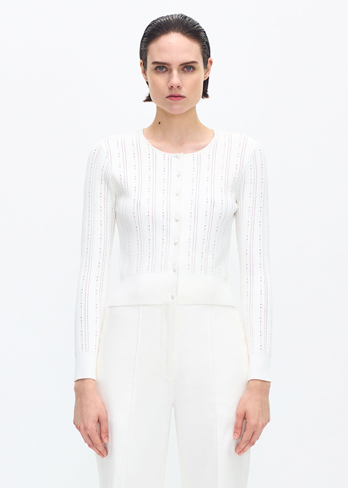 model wearing the faye cardigan in ivory